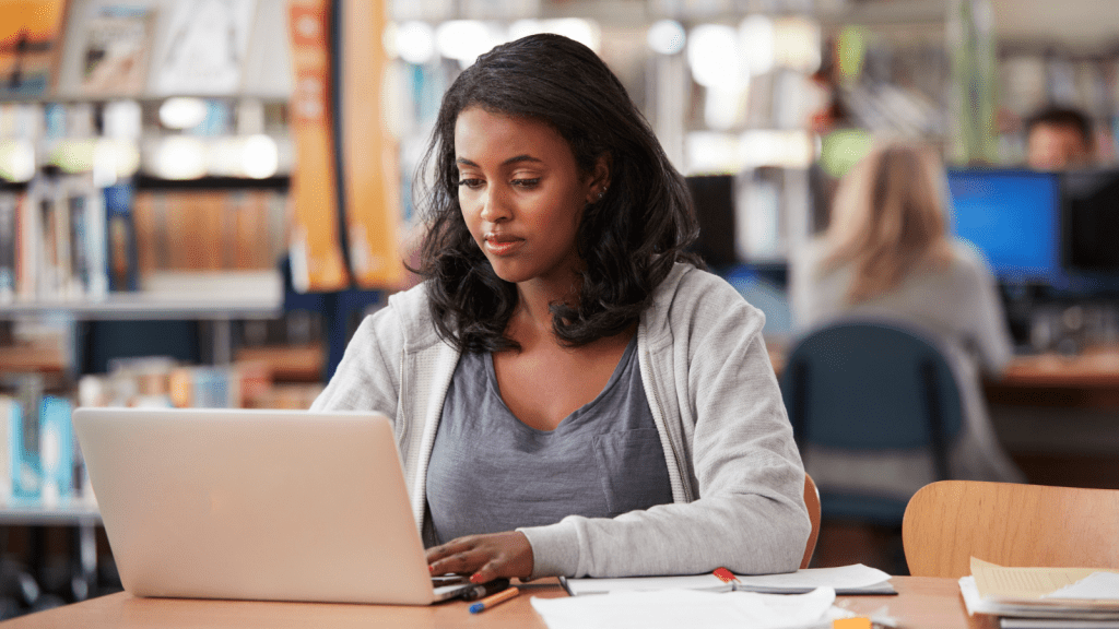 Student studying laptop